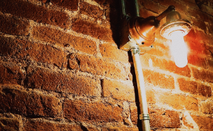 Brick wall with a light