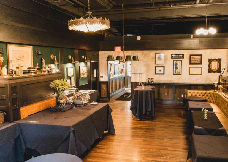 Inside photo of a classy room with tables covered in linen