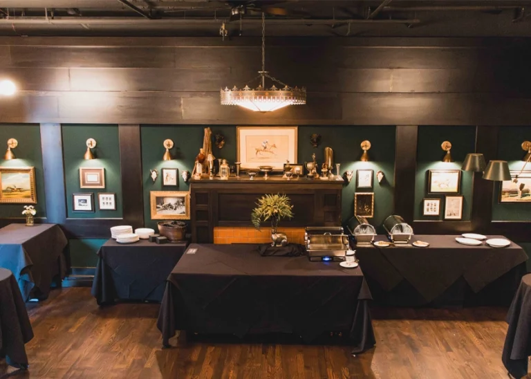 Inside photo of a classy restaurant with green leather seating